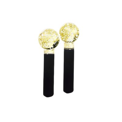 esfera amarela com glitter para cromoterapia e massagem facial